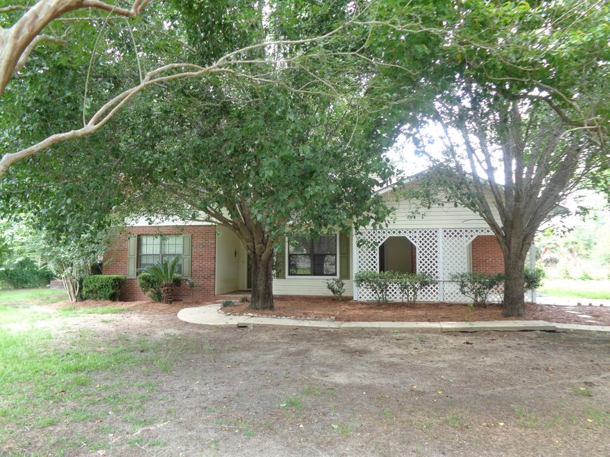 Move in ready located on large corner lot. Lot is completely fenced. Home is Brick with Vinyl. Inside the home features open floor plan. Living room with fireplace. Kitchen has ample cabinet space. Plenty of storage thru out home. Nice deck to enjoy this large shaded lot.