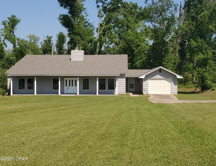 CURRENTLY UNDER CONTRACT, SELLER ACCEPTING BACKUP OFFERS.Nice, large home that sits less than 5 min from Marianna recreation fields, Marianna High School, Marianna Middle School and is only about 7 min from Chipola Jr College.  The Oaks neighborhood has nice homes on large lots with mature trees in a peaceful setting.  There have been many upgrades to this home such as 2 new energy-efficient central AC for downstairs, along with a new mini split system for upstairs.  New vinyl plank floor throughout much of the home.  New architecture 30yr roof installed later 2020. New stainless steel kitchen appliances and granite countertops.  The living room has its own bar area with a separate wet bar and cook station for entertainment, overlooking a fully fenced indoor pool.  Two of the bedrooms and makes this already large room feel even bigger. The kitchen counter features new granite and a small tile backsplash.  There is a good sized indoor utility room with access from back of house.  Call today and make this unique property your own.