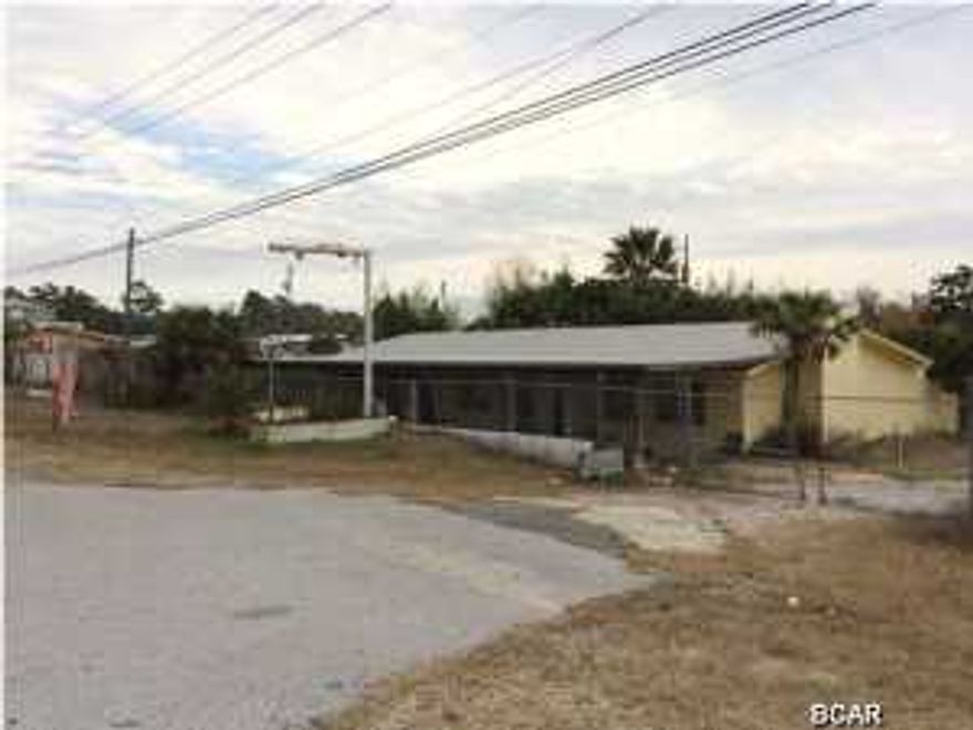 This is a great opportunity to own Parkway frontage for a very low entry price. The building is in good serviceable condition over all. The zoning is C-2 and there is 125 feet of frontage on Back Beach.The property is currently on septic and can be upgraded. The city has confirmed that sewer is available to the property and on the same side of the road.