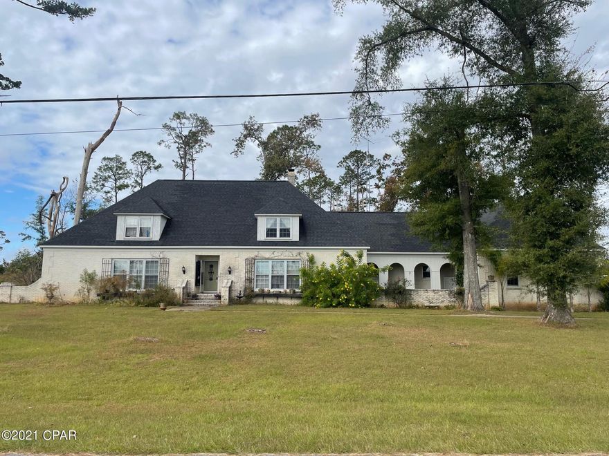 'CURRENTLY UNDER CONTRACT, SELLER ACCEPTING BACKUP OFFERS' A very special home with huge possibilities. 5 BR/5 Baths, 6485 sq ft, 2 story home. The home is in need of repair from Hurricane Michael. Roof appears to be good, interior need some work including but not limited to flooring, painting, appliances, heating and cooling, some structural but repairable. In it's day this was the Home of the community. The main home has 3 BRs/3Baths, the attached Mother n law suite has 2 BRs and 2 Baths. Fix it the way you want it!!