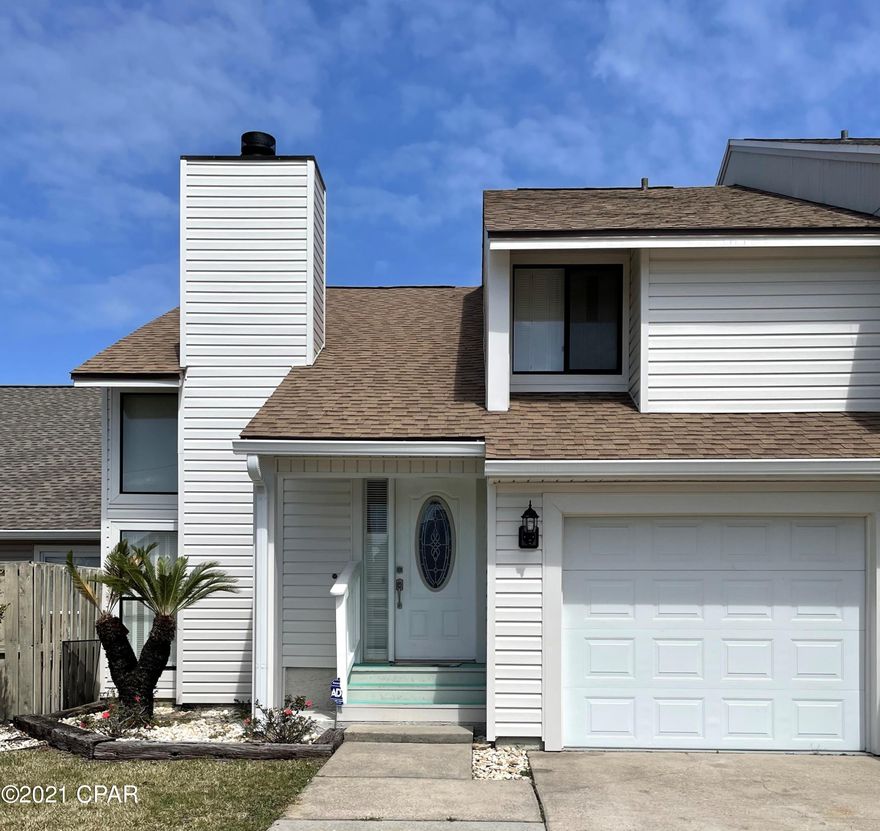 CURRENTLY UNDER CONTRACT, SELLER ACCEPTING BACKUP OFFERS HUGE PRICE DROP - Motivated seller ***Spacious townhome extremely convenient to 23rd Street and Hospitals. Large kitchen with breakfast bar; a new kitchen makeover would make this place a dream home.  New LVP flooring in dining and living room, new roof and vinyl siding since Hurricane Michael.  A floor to wall  fireplace is a beautiful focal point in the living room. The spacious master bedroom has double closets and bathroom with shower. An oversized single garage with opener leads into a large Laundry room.  The AC unit is on a contract and serviced annually.  Seller will give a $3000 flooring allowance with full price offer.