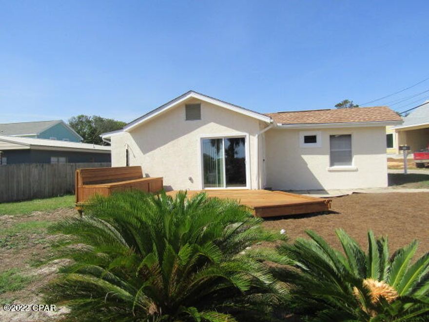 West End!  Walking distance  to the Beach!  2 bedroom, 1 bath beach cottage with new a/c unit. This home features an open deck with built in  storage, and a ''peak view'' of the Gulf!