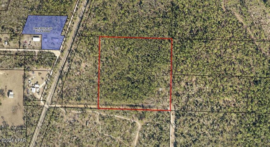 10 acres of unrestricted land in Fountain. Endless possibilities with only a 30 minute drive to Panama City Beach.