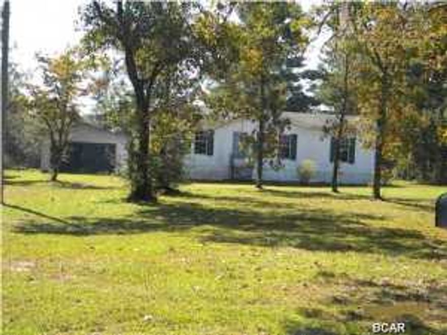 Want a little room in a quiet area but convenient to town and shopping? Well here is the home for you. This well maintained 3 br, 2 ba home has a master bath with a large soaking tub and separate shower, a rear deck to sit and relax on and for dad you have a detached 2 car garage/workshop with work benches and electric to keep him busy all on an acre lot. You don't want to miss out on this home so call today.