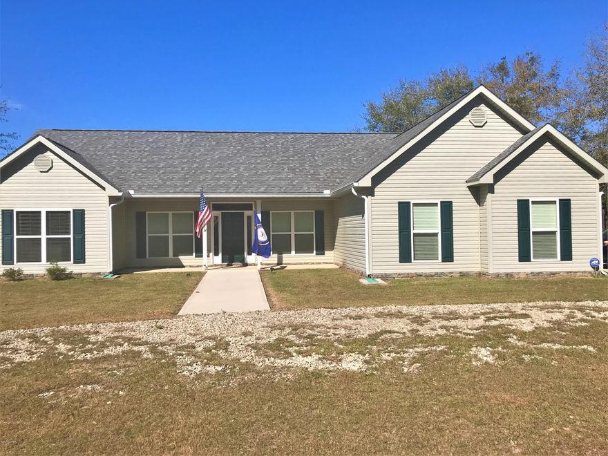 Huge detached Apartment in barn!! 2014 3/2 home with 2/1 and half bath apartment in barn. This beautiful property is fenced and cross fenced! Property includes huge barn, pole barn with RV hookup, 10 dog kennels and a chicken pen! Barn includes roll doors and an apartment. There is also a small out building for grilling out that includes a double sink. Main yard is completely fenced with electronic gate. Pasture is fenced and ready for some farm animals. Main house nearly brand new with a 3/2 split floor plan with hardwood, granite and cherry wood. This home is laid out for maximum sf usage. Absolute beautiful view from the enclosed porch! Apartment has 1632 sf w/749 sf heated and cooled. Close to Panama City, Marianna, Dothan, Blountstown, Youngstown.