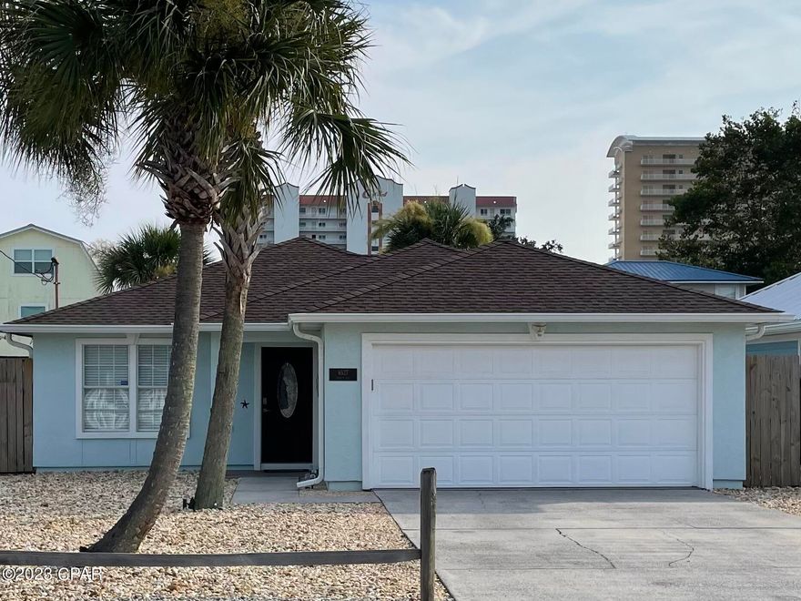 Back on the market at no fault of the seller. The buyer backed out because of their own personal reasons. This beautiful short-term rental approved home offers 3-bedroom, and 2-bathrooms. You'll love the convenience of being able to walk to world famous white sandy beaches! Highlights include, a two-car garage, a privacy fenced in back yard, Located on Panama City Beach close to shopping, world class dining and a short drive to scenic 30A. Upon entering the home you'll notice the open floor plan and natural light that flows throughout the home. The kitchen offers updated stainless-steel appliances and quartz countertops, and a large pantry for all your kitchen must haves. The living room provides plenty of comfortable living space, and life proof porcelain title throughout the home. The master bedroom is spacious, and offers a private master bathroom, that has been updated with a new vanity, and a beautifully tiled shower. You'll also notice the guest bathroom has been updated also. The other two bedrooms provide plenty of comfortable space for family and guests. Whether you're looking for a primary residence close to the beach, a second home or a potential investment property this home is a must see!