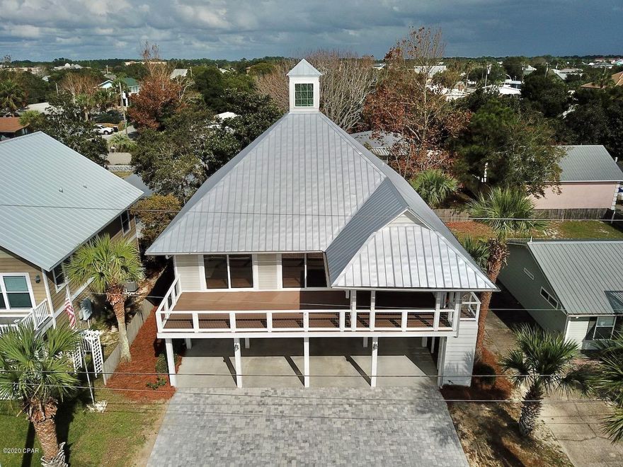 We Love Love Love this Bid A Wee Beach home for so many reasons. Not only is  this home in the SHORT TERM  RENTAL area of this community, it is also only a block & a half from the dedicated beach. Some of the other awesome characteristics of this multi-unit home include; a ground floor separate rental or  living quarters, complete with living area, bedroom, bunks and kitchen (live in the bottom unit and rent out the rest or rent both units). The top two floors of this home boast of a bright open living/kitchen area that has 3 sets of sliding doors which open to the sun deck that has beach views galore. The oversized balcony stretches the entire length of the home. There is plenty of parking for cars and beach toys on the oversized driveway. The location of this home is Brilliant! Come see