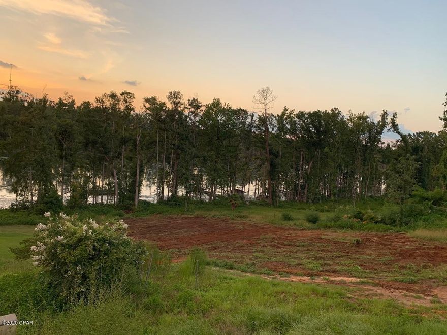 WATERFRONT on Merritt's Mill Pond!!   This vacant waterfront lot comes with a dock and a view.  Located about halfway down the 4 mile long spring fed lake, this lot is just a couple miles from Jackson Blue Springs.   A magnitude one spring that pumps out close to 65 millions gallons of water daily.  Enjoy kayaking, canoeing, swimming, boating and fishing.  This property is cleared, so come prepared to build your dream home.   The County is installing water and sewer lines throughout the neighborhood and this property is in Phase II of that instillation Scheduled to start in the next few months.    There are only a limited amount of vacant water front lots left, and this one just may be the best of them all.  Come see for yourself!!