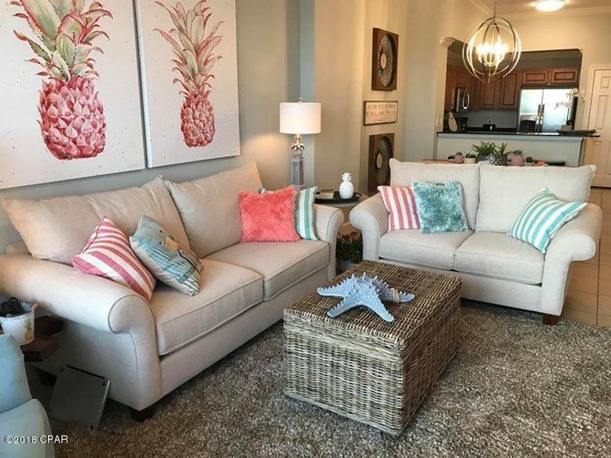 Seller sells Bring Offers! Great price reduction! A must See Unit!  Located on the 5th floor with the best high end furnishings.  The sellers took a lot of effort and money to create the high end decorations and motif of this unit.  From the furnitures to the accessories.  This unit is never been on a rental pool, but will definitely generate a great income due the locations and the presentation of the unit. Approximately $40-45k gathered from the history of other like units.  Sunrise Beach has a parking under the building, with two pools, splash fountain area, BBQ grill, gulf front fitness center and conference center and conveniently close to Pier Park.