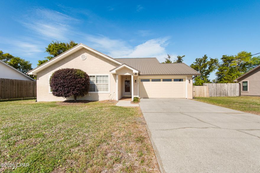 Located in the desirable Oxford Place/Forest Park subdivision, this 3-bedroom, 2-bath home offers exceptional convenience in the heart of Panama City--just minutes from 23rd Street and Highway 390. This is a location-driven opportunity, ideal for buyers prioritizing accessibility to shopping, dining, schools, and everyday amenities.

Situated on over 1/3 of an acre, the property features a spacious, fully fenced yard with ample room for outdoor living, pets, or future additions. An outdoor shower adds functionality and coastal practicality.

The home has been thoughtfully updated with new flooring throughout, new carpet in the bedrooms, and updated bathroom countertops. Major systems have already been addressed, including a durable metal roof installed in 2018, a new stove, and a new hot water heater.

Additional features include an irrigation well supporting the sprinkler system, gutters for proper drainage, and the added protection of a termite bond.

A solid option for buyers seeking a well-maintained home in a highly convenient central location with room to grow.