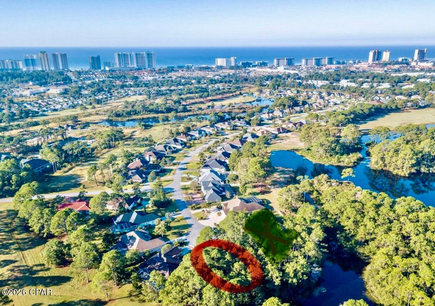 Ready for a CHANGE? CREATE your NEXT WONDERFUL LIFE on this INCREDIBLE HOMESITE, one of the last available in THE GLADES, one of Panama City Beach's most BEAUTIFUL ESTABLISHED communities. The CUL-DE-SAC setting comes with an impressive 144 feet of rear frontage offering TRANQUIL WOODED and WATER VIEWS! Build your custom dream home in a location that perfectly balances SERENITY and CONVENIENCE. Enjoy remarkably low HOA fees all while staying minutes from golf courses, bridge-to-town access, and a vibrant array of dining, shopping, and entertainment. New hospital and ancillary medical services are being constructed nearby as are retail and casual dining spots. A brand new DOLLYWOOD theater, TOP GOLF, and PIER PARK shopping and dining are minutes down the highway.  The location south of Panama City Beach Parkway places you within minutes of AWARD WINNING SUGAR SHORE and EMERALD WATERS as well as numerous UNIQUE GULF and LAGOON FRONT DINING destinations. For more convenience...THREE access points into THE GLADES, two at LIGHTED INTERSECTIONS! This GOLF CART COMMUNITY is home to a great new addition, the POPULAR DUPLIN WINERY! Come pour a glass to CELEBRATE your DECISION to CHANGE your LIFE!