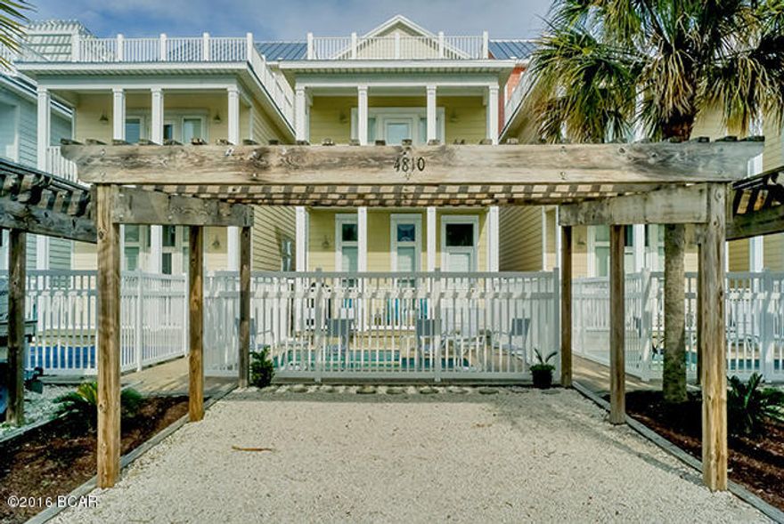 Beautiful Fully Furnished Key West style 3 Story Beach Home with private swimming pool. Located just steps from the beach and Gulf of Mexico this beautifully appointed home has hardwood floors, granite countertops, white appliances, huge walk in shower in master bedroom, fireplace and 3rd floor 19 x 23 sq.ft. sundeck. The home is presently a great vacation rental home.