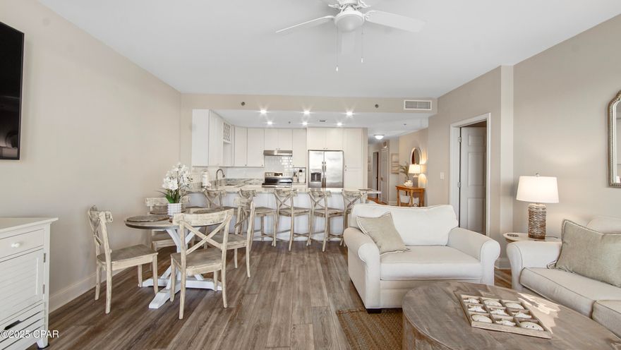 FULLY FURNISHED & A CURRENT CASH FLOWING INVESTMENT!!

Welcome to Laketown Wharf #234, a stunning, fully renovated 3-bedroom, 3-bath residence offering breathtaking views from the main living area, primary suite, and oversized balcony. The unit is located on the second floor, offering convenient access to the parking garage—if you park on Level 2, you can walk directly to the unit without needing the elevator! Plus, you're just steps from the beach!

Laketown Wharf is one of the most sought-after buildings in PCB. This turn-key condo combines coastal living and convenience. The unit has a strong track record of rental income. And a full-year expected to be $56,000, it presents an outstanding investment opportunity—or if rentals aren't the goal, this beautiful unit can also make the perfect second-home getaway.

The resort features some of the largest floor plans in PCB with 9-foot ceilings, and an impressive list of amenities including: five pools, two hot tubs, a putting green, and a fitness center with Gulf views. As the sun sets, enjoy the nightly 8 p.m. light show that adds a touch of magic to your beachfront evenings. The complex also offers on-site dining, billiards & bowling alley, and much more! Your family or rental guests will love vacationing here and want to come back every year!

Step inside to discover an open-concept layout designed for entertaining, featuring coastal-inspired finishes, updated flooring, lighting, and premium furnishings. The updated kitchen is equipped with stainless steel appliances, granite counters, and plenty of storage. The spacious primary suite offers balcony access and a spa-like en suite with a soaking tub and a walk-in shower with multiple jets. Every detail has been carefully curated, from the decor to the thoughtful updates.

The condo also includes a NEW AC unit, washer/dryer, and parking just steps away with minimal elevator traffic. Experience the perfect blend of luxury, location, and income potential—this one truly has it all.