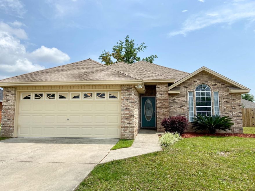 Taking back up offers.  Under Contract.   The house you have searched for is located in desirable Britton Woods  in Lynn Haven.  Did I mention there are no HOA fees?  This all brick three bedroom, two bath house features a screened in back patio, with a large fenced backyard and even has something Hurricane Michael failed to take out. There  are trees so you can enjoy your afternoon relaxing on the swing in your private backyard.  This house fetures 10' ceilings with crown molding and a fireplace  in the living area and in the master bedroom you will find a trey ceiling.  You must call today to tour this house which has a new roof, new carpet, tile floors, newly renovated bathrooms, and new hot water heater.  There is an oversized  2 car garage,  storage shed and a sprinkler system.  Don't delay, call today and schedule your private tour.