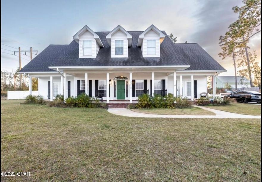 Enjoy quiet City living in this farmhouse inspired home on a half acre lot!! 3644 square feet, 4 bedrooms/4 baths, with an office and bonus room. This home boasts a beautifully remodeled kitchen featuring a farmhouse sink, glass electric cooktop, show-stopping stainless steel Cafe' appliances, breakfast bar, complete with wine bar and wine cooler; 2 primary suites/2 living areas. Amenities include a 2 car garage, laundry room with sink, a sun room with a separate entrance, gas fireplace and swimming pool. A front porch and back porch allow for outdoor living and entertaining! This home is on a private driveway, has a large fenced back yard and adjacent to a walking park and children's playground is  just minutes away from shopping, schools & entertainment!