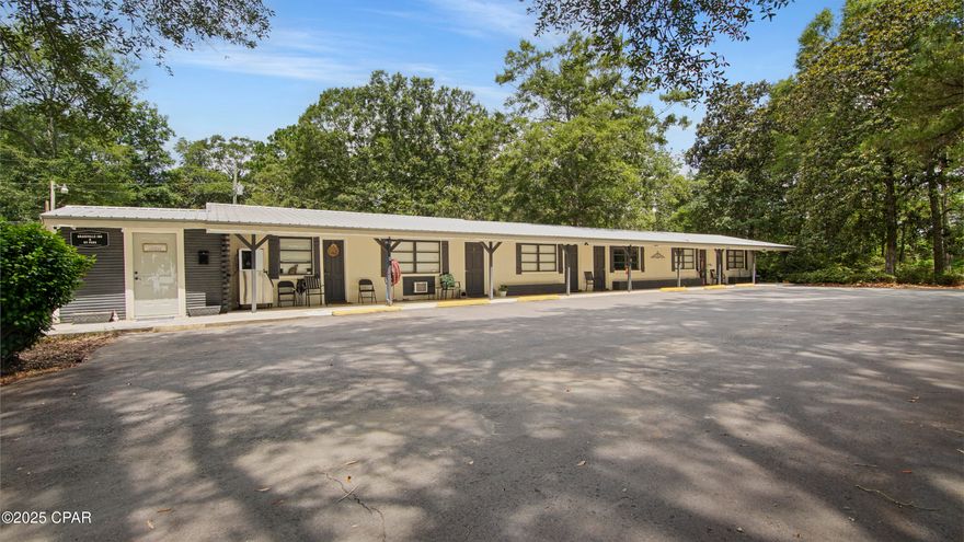 Excellent investment opportunity! Currently operated as Graceville Inn and RV Park. 6 Inn units were converted into efficiency units leased 7 month terms, 1 unit is used for storage but has a bathroom and can be converted into a rental. A separate building contains 2 more units. There are 8 RV spaces, and two efficiency ''cabin'' units. Gross rents are $7,000+/month with current tenants being long term. The site has 2 wells and 3 septic systems. The property also has a walk trail for the residents as well.  With 8.65 acres total, there is plenty of room to expand.
