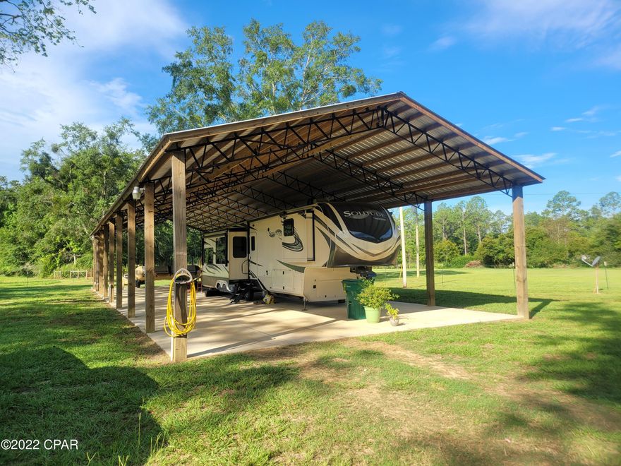 Currently under contract-Owner will accept back up offers. Quiet country living with this 17+/- acres with plenty of spots to pick your homesite. There is a 36.6'x96' pole barn with power and septic hookup for RV. Well house has newer pressure tank, washer and dryer and plumbing to turn on 2 sets of sprinklers. 3 phase power. Property has fencing in place for 2 pastures that has water available perfect for a small hobby farm. Not far from pavement. Camper does not convey.