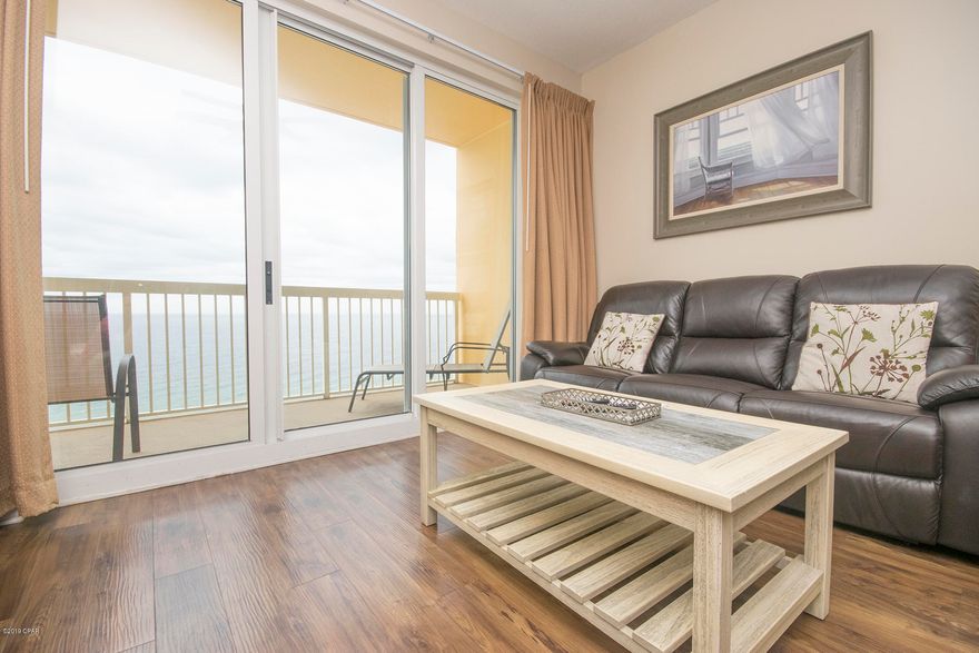 Gulf Front Calypso Condo unit located adjacent to Pier Park featuring 2 bedrooms and 2 bathrooms plus bonus bunk room with door for privacy. Unit offers Gulf front master bedroom with balcony access, well sized guest bedroom with bath, full bonus bunk room, open kitchen with granite tops, large volume living room, dining area, and large utility room. New kitchen appliances 2018, new washer/dryer 2017, and new hybrid water heater 2016. Calypso offers multiple gulf front pools, hot tubs, garage parking and walking distance  to Pier Park.  See Agent remarks for showing. Caliber Home Loans has 10% down financing with 30 year fixed terms on Calypso.