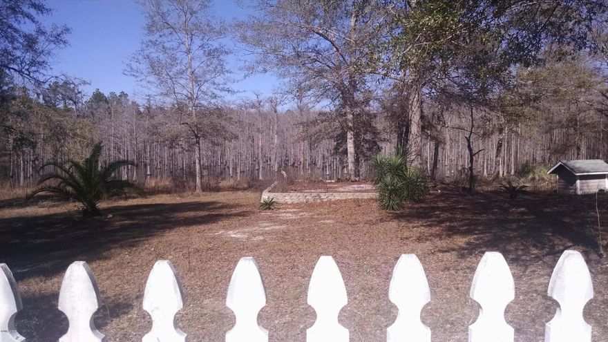 Beautiful lot in the Southgate subdivision. Has some large shade trees, cleared and ready to build on. A large stone patio already in place. Lot fronts on a large cypress pond.