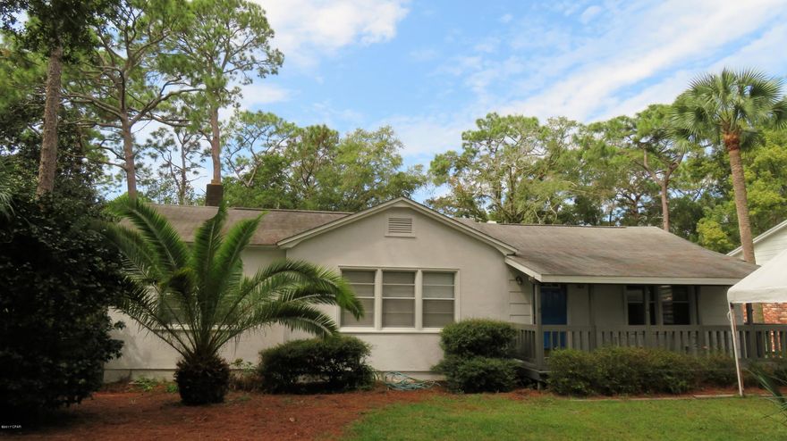 3 Bedroom, 2 Baths home in the COVE! This 40's home was remodeled in 1994 and has a nice contemporary split bedroom floor plan. A welcoming foyer leads to the  Master BR with vaulted ceiling, walk-in closet, tile floor, dual vanity, garden tub and linen closet. The living room features crown molding and  connects to  2 roomy bedrooms  with hardwood flooring.  An inviting guest bath features wood laminate flooring, lg vanity & tub/shower combination.  The cozy eat-in kitchen invites to stay and  offers plenty of cabinet space,gas range, DW, refrigerator, pantry & laundry cabinet. 12x18 screened porch with adjoining open deck and generous steps lead to the double carport with WORK SHOP and storage room. Lots of parking in back and front of home. Closing cost assistance or carpet allowance!