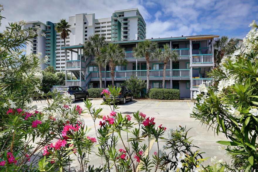 'CURRENTLY UNDER CONTRACT, SELLER ACCEPTING BACKUP OFFERS'  This ground floor 1 bed/1 bath end unit at Nautical Watch is perfect for your beach getaway!  Just a short walk to the sandy beach and steps away from the pool, you'll enjoy the laid back lifestyle in this low density/ low rise complex.  The kitchen with breakfast bar has seating for 4 and includes all appliances.  The living room has seating for 4 and includes a sleeper sofa.  Updates include new roof, new carpet and new stackable washing machine.  Enjoy beautiful views out to the private patio which has a direct view of the pool.  Amenities include bbq grills and picnic area, heated pool, courtyard and dedicated beach access.  Make this your beach vacation home or add it to your rental portfolio.