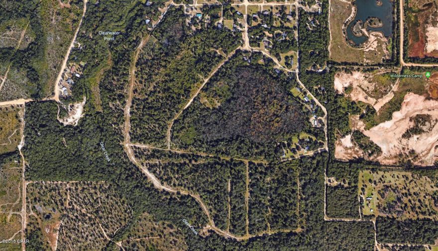 Here is your chance to purchase an already platted subdivision which holds approximately 103 parceled lots that are 1+ acres. The property is high and dry with roads already cut through. More info on file i.e. development plans, parcels, etc....