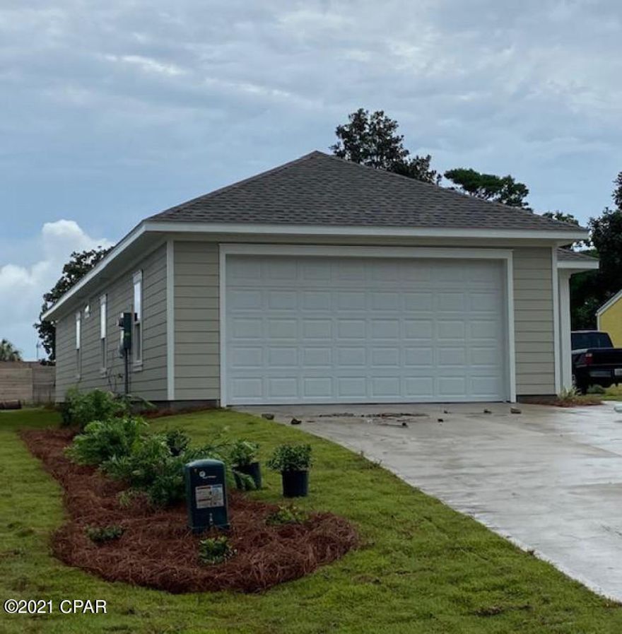 BEAUTIFUL BRAND NEW CONSTRUCTION ON WEST END to be completed by 8/1/21. PRIME LOCATION South of PCB Parkway. 3BR/2BA w/2 car garage less than 6 miles to 30A, approx 5 miles to Pier Park, and just a few blocks to The World's Most Beautiful Beaches! 9' ceilings with trays in L/R and master bedroom, 2X6 exterior walls, popular luxury vinyl plank throughout, real wood shaker style cabinets w/soft close drawers and doors, granite counter tops, 6X12 subway tile backsplash, stainless steel appliances, fully landscaped with irrigation system and zoysia sod, large fenced in back yard, and more!