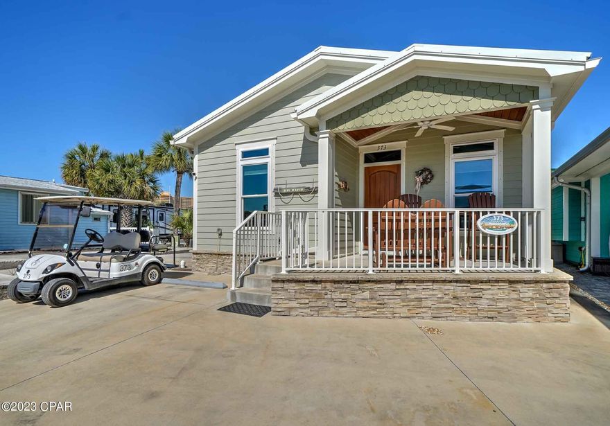 Would you like to spend your days watching the iconic boats come in and out of Grand Lagoon? Well, here's your rare opportunity to do just so!  This 2020 beautiful build has tile flooring, granite countertops and stunning finishes. Great open floor with a nice size kitchen and living room. This may indeed be one of the best locations within the resort. The sweeping views of the Lagoon are incredible even from the comfort of the living room or enjoy them from the raised from porch... just truly breathtaking!  Perfect for second home or investment opportunity! Venture Out is a golf cart community that has exploded with popularity recently. With 300' on the beautiful pristine beaches of the Gulf of Mexico and 1,000' on the Gulf!