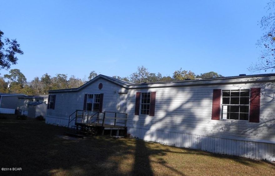 3BR/2B mobile home located in a residential community and near grade school. Spacious rooms with open living atmosphere. Family room has fireplace. Split bedroom floor plan.  Being Sold ''AS IS''. Equal Housing Opportunity.