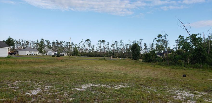 Best Lot in the Subdivision. Cleared and Ready to build. Very private lot in the back of Sandy Creek & Country Club Subdivision.  Cul De Sac Lot. High and Dry. Very private in a  quiet Rural Area. City utilities cable, electricity, water and sewer ready. Creek runs along one side and back of the lot. Great Location, Tyndall AFB only 25 minutes away. Shopping and Restaurants 15 minutes away. Cooks Bayou Marina near by.