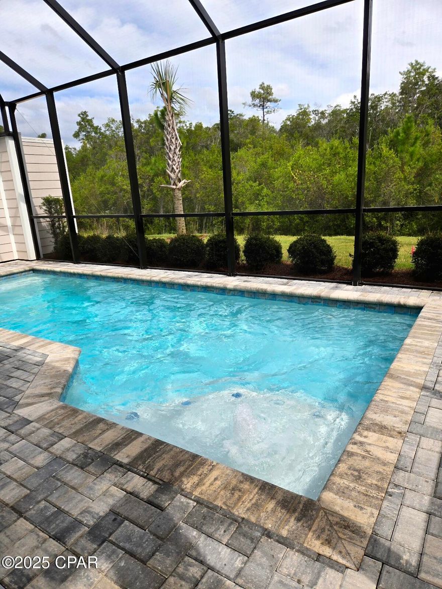 Live the coveted 55+ community of Latitude Margaritaville Watersound right now!  Home available for 1 year ONLY includes a POOL.  Relax on the screened in lanai with a preserve view.  It just doesn't get any better!  Close to all the amenities!  This Nevis Villa features 2 bedrooms, 2 baths, den, fireplace, wine cooler and a 2 car garage.  Fully FURNISHED and all appliances included refrigerator, range (electric), dishwasher, microwave, washer and dryer.  No yard work required so you'll have lots of time to enjoy all the amazing activities and meet new friends!

RENTAL REQUIREMENTS:
At least 1 tenant MUST be 55+
LONG-TERM (1year only) 
SMOKING is not permitted in any home or lanai/porch
BACKGROUND CHECK (credit, criminal, eviction) required & paid for by each tenant
NO pets
$$ Due upon lease signing: Security Deposit $$ Due at Lease Start:  1st mo + last mo+ cleaning fee due at move-in
COMMUNITY ACCESS - tenants purchase all gate & amenity access credentials through HOA (transponders & passports).  Tenants have full use of all amenities just as a homeowner has.