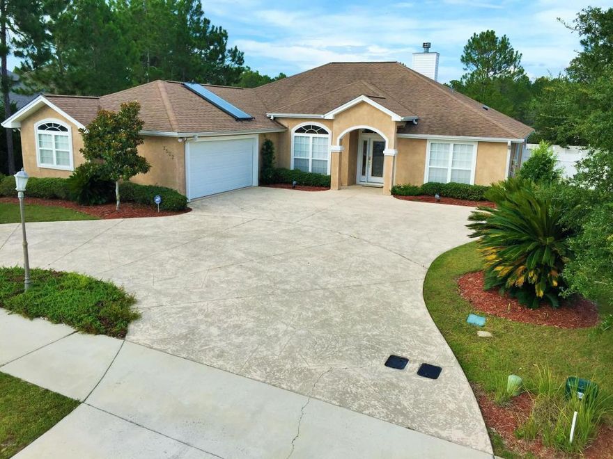 */*/*/ IN THE HAMMOCKS W/ A POOL /*/*/*Immaculate home in unmatched Hammocks Subdivision. Interior features include:  volume ceilings, engineered wood flooring, large tiled sun room, washer and dryer, solar hot water, gas fireplace, upgraded stainless steel appliances, built-in entertainment center, home office with French door entrance, newly painted garage floors, state of the art master bathroom. Outdoor features include splendid pool with refreshing waterfall, privacy fenced in back yard, large pool/patio deck for entertaining, storage shed in back yard. All sizes and school zones are approximate and should be measured by buyer if important.