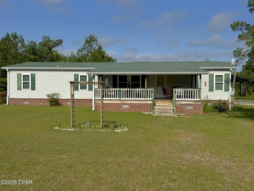 This beautiful 3 bedroom, 2 bath home sits on approximately 9.5 peaceful acres and comes complete with a stocked fish pond filled with bream and catfish, offering the perfect place to relax and enjoy quiet country living. Located on a paved road, this property combines convenience with a peaceful setting and plenty of room to spread out.
Please note; property appraiser shows 2 acres however, they have added and approximate additional 8 acres, survey is complete.


Outside, the property is loaded with amenities including a 24x60 pole barn, a 24x48 barn, a 12x16 workshop, an attached screened cook shed complete with a sink, and a 10x12 metal storage shed. There is also a separate fenced garden area perfect for growing vegetables, flowers, or herbs. Whether you need space for hobbies, equipment, animals, gardening, or entertaining, this property has it all.



Inside, you'll love the spacious layout featuring both a living room and a separate den/family room. The laundry room includes a large pantry, while the kitchen offers an abundance of cabinets and workspace. The spacious master suite features a private bath with a separate soaking tub, walk-in shower, and a large walk-in closet.



Additional updates include a metal roof replaced in 2018 and an HVAC system that is approximately 10 years old with a 13 SEER rating.



One of the highlights of the home is the cozy 22x12 front porch, the perfect place to enjoy peaceful mornings and relaxing evenings while overlooking the beautiful country setting. If you've been searching for country charm with plenty of extras, this property is a must see.
Property Appraiser site shows 2 acres seller has added an additional 7.5 acres. Survey is complete.