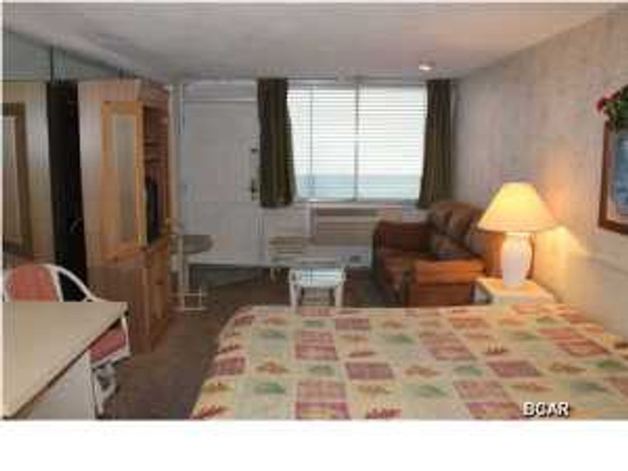 Fontainebleau Terrace is a great low rise gulf front condo complex. This east facing top floor fully furnished efficiency unit even has an adjoining door to the unit next to it, which is also for sale. Purchase one or purchase both. Come see these great bargains today! (all information approximate, please verify)