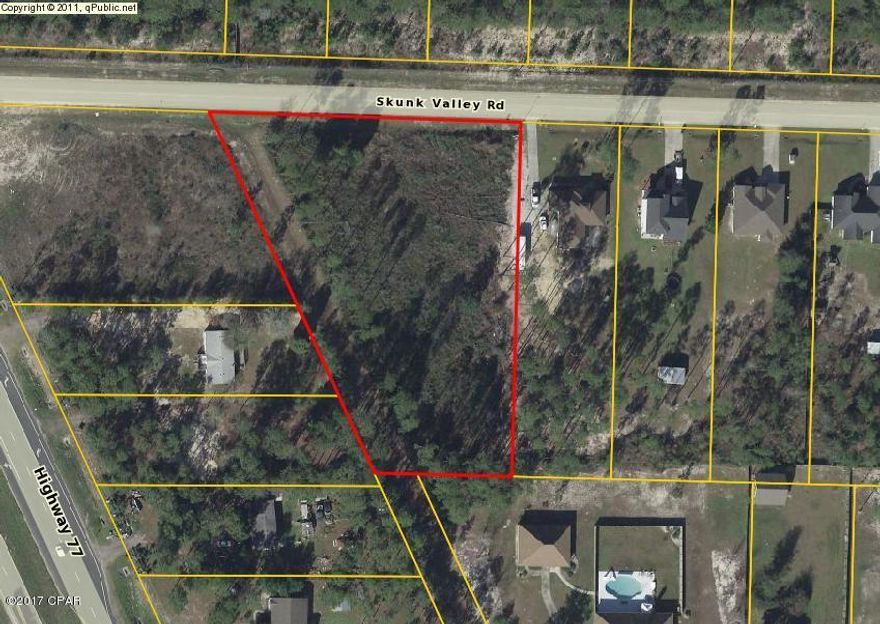 This beautiful wooded lot is priced to sell.  It sits just off Hwy 77 and will be perfect for your new home site or as an investment property.  This lot is very spacious and offers easy access to Lynn Haven, Panama City and the Air Port, while providing a country setting.  It is close to Dean Bozeman School and many different fishing spots.  This property is located in the White Oaks Sub-division which boasts many beautiful homes.