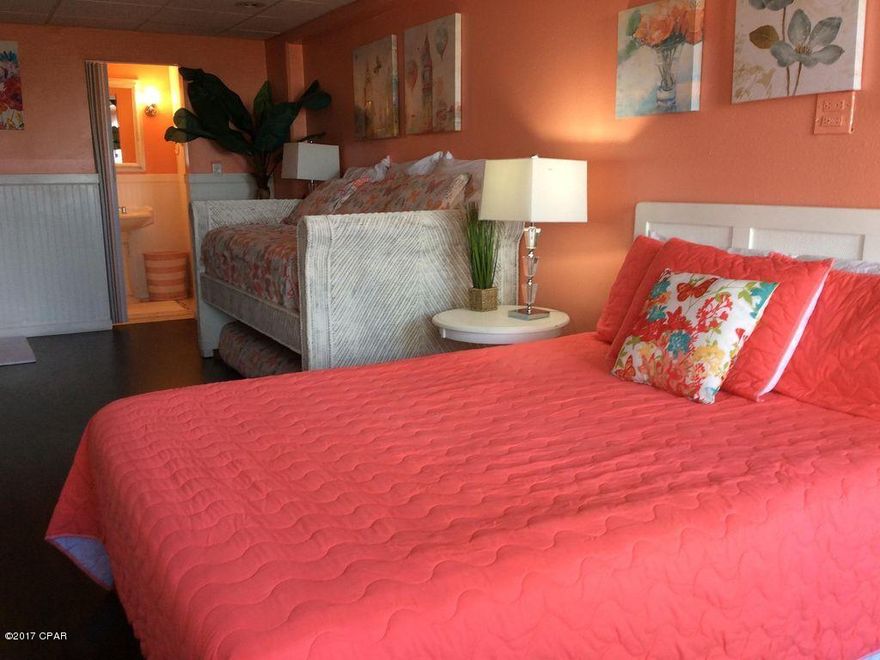 Enjoy a million dollar view at a great price and an ocean view when you wake up every morning! This unit is on the fourth floor adjacent to Bid-a-wee Beach - a one mile undeveloped beach to the east. Unit is fully furnished and upgrades include new floor, new paint, total new bathroom and closet. Includes one queen bed, trundle bed and sleeps five. Amenities include indoor pool, covered and uncovered decks bbq grills, owners lounge, elevators and recently updated exterior. Ready for rental, vacation or both.  COA fees cover water, pest control, cable & internet and electricity!