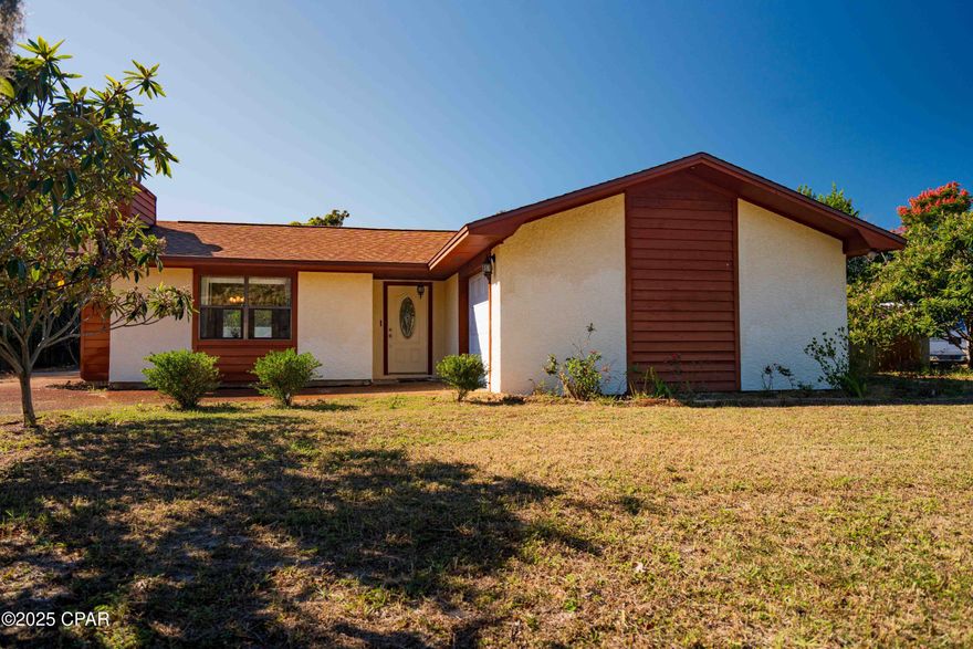 Motivated seller! Bring all offers!! Welcome to your slice of Florida paradise in Lagoon Oaks, a sought-after area where locals love to live. This solid, well-built 3-bedroom, 2-bathroom beach house sits on a large lot with a paved driveway spacious enough to park your boat, RV, or both!

Enjoy the freedom of no HOA, a garage for extra storage, and plenty of room to relax or entertain in your huge front and backyard, surrounded by mature fruit trees. Imagine quiet mornings under the palms and stress-free afternoons just minutes from the beach.

With just a little TLC, this home has incredible potential to become your perfect coastal retreat or full-time residence.

Experience true Florida living — easy, breezy, and all your own!