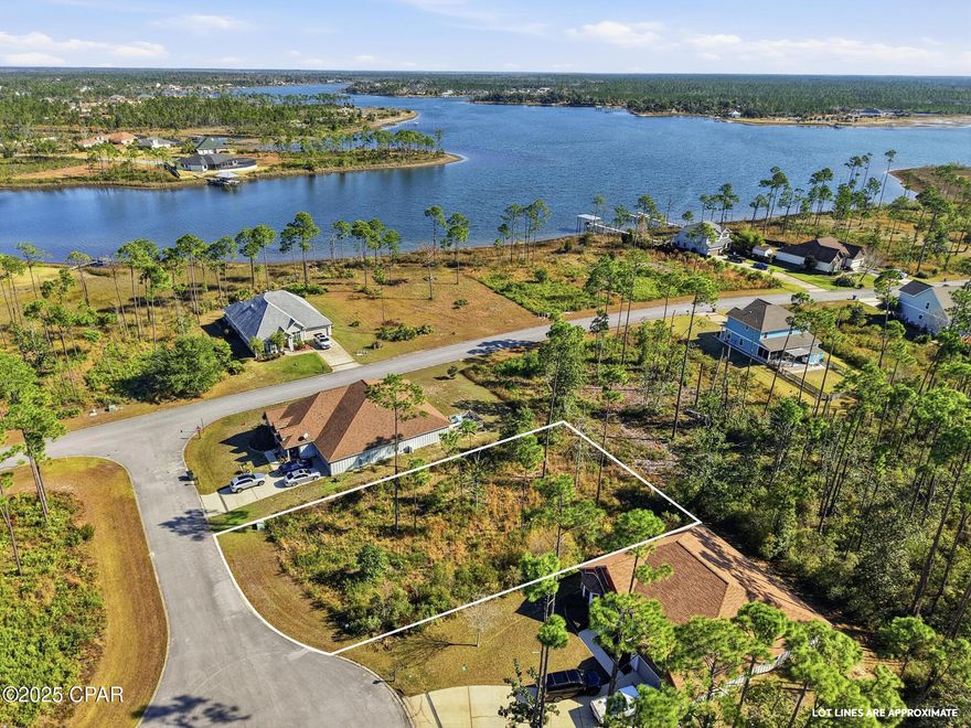 Currently under contract, seller accepting backup offers. Best-priced homesite in Laird Point! Ideally located near the tip of the peninsula, this exceptional lot offers the opportunity to build a two-story home and capture beautiful views of East Bay and Laird Bayou.

Laird Point is a sought-after gated waterfront community known for its coastal charm, ribbon-curbed streets, underground public utilities, and natural landscaping. Water views surround you at nearly every turn, with stunning custom homes throughout the neighborhood and new construction underway.

Community amenities include RV and boat storage, a private community boat launch, excellent fishing, tennis courts, a brand-new pickleball court, and a half-court basketball area—perfect for an active coastal lifestyle.

Conveniently located just 9 minutes from Tyndall Air Force Base, close to shopping and dining, a short drive to Mexico Beach, and approximately 40 minutes to Panama City Beach and the Emerald Coast's sugar-white sand beaches. All measurements are approximate and should be verified if important.