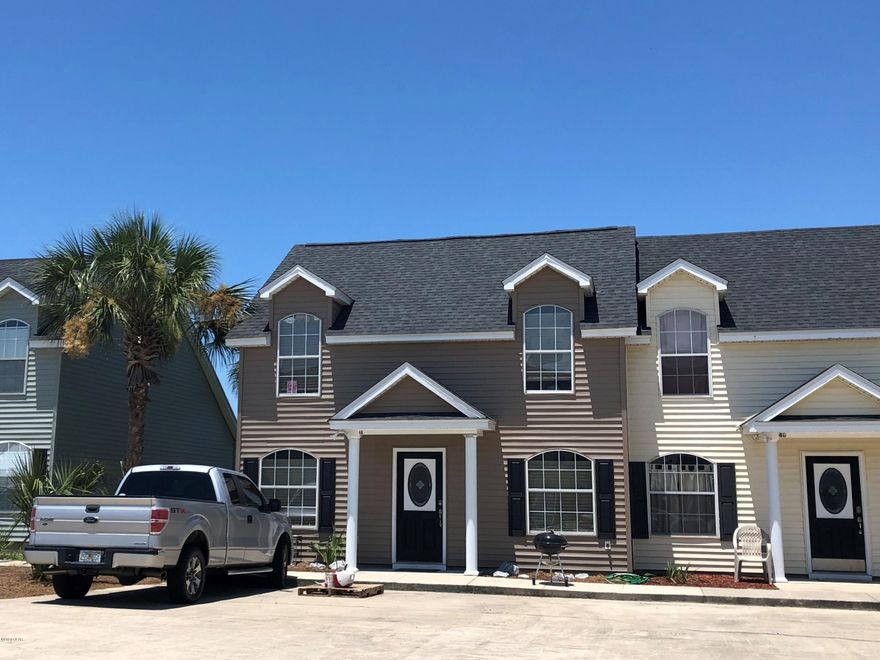 Townhome in ''The Palms'' at Mexico Beach, Florida. This 3BR/2B with 1,320 SF that has been totally renovated, new tile flooring, new carpeting upstairs, new kitchen, counters and appliances, new bathroom sinks and counters, new AC unit, interior painted. New Roof, vinyl siding and facia. The ground floor has the living/dining and kitchen, as well as laundry and storage under the staircase. The Master Bedroom is also located on the ground floor and there are two additional bedrooms and a full bath upstairs. There is a large room for storage upstairs. The Community pool is nearby. The beach is about 1/2 mile away. HOA dues are $1,440 Annually.