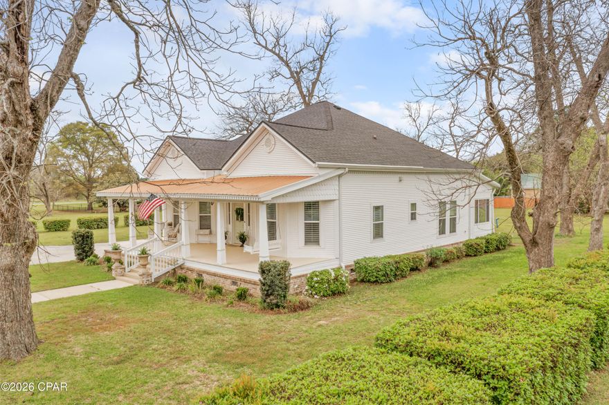 Step into timeless Southern charm with this stunning 3-bedroom, 2-bath historic home set on nearly half an acre of beautifully manicured grounds. Built in 1908 in the heart of a pecan grove, this remarkable property blends classic elegance with modern updates while preserving its original character.

From the moment you enter, you're welcomed by a grand foyer featuring LVT flooring (original heart-of-pine floors are underneath if you prefer them) and soaring ceilings, highlighted by a breathtaking antique gasolier glass chandelier. The home showcases exquisite details throughout, including crown molding, tall ceilings, and five fireplaces--two equipped with gas logs.

Thoughtfully updated for comfort and efficiency, recent improvements include a 2021 roof with lifetime Atlas shingles, new decking and underlayment, 30 inches of insulation, copper penny roofing on the carport and porches, energy-efficient double-hung vinyl windows with Plantation shutters / blinds. Rheem central heating and air, and a Generac whole-home generator.

The spacious kitchen is perfect for entertaining, featuring granite countertops, a large center island, and all-new stainless-steel appliances. Just beyond, enjoy a heated and cooled sunroom overlooking the private, fenced backyard--an ideal space for relaxing with a glass of lemonade

Located on a prominent corner lot along the main street in the charming town of Malone, this home offers small-town living at its finest--just a short walk to local shops, schools, the post office, and dining, and a quick drive to Marianna.

A rare opportunity to own a piece of history with modern comforts--this Southern gem is ready to welcome you home.