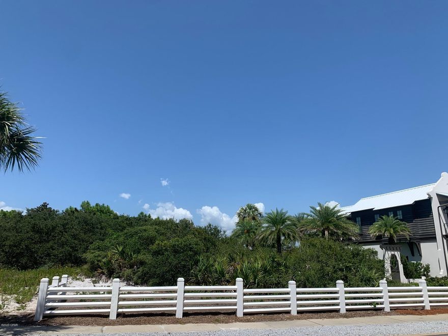 Beautiful ''one-back'' lot across from the Gulf of Mexico and on beautiful Lake Carillon, this great piece of property can accommodate a main house and a guest or carriage house.  Build your dream vacation home, investment property, or full time residence on this little piece of paradise. The Carillon Beach Community is the place to call home on the Gulf of Mexico - close to Pier Park, 30-A, shopping, and restaurants.