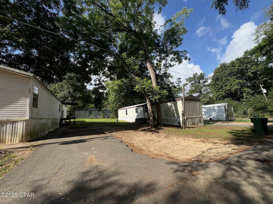 Welcome to Friendly Acres, an income producing mobile home park with 19 homes only 5 minutes from downtown Marianna, FL. Situated on 9 acres, this park features fifteen 3 bed/2 bath homes, one 3/1.5 home, and three 2/1 homes. All units are currently occupied and generating $13,375 per month. Many homes are leased below market rent creating an easy opportunity to raise cashflow. All homes had new metal roofs installed in 2019. There are 2 wells on the property with one having a new pump and tank installed in 2024 with the other well having the same work done in ~2020. There are approximately 15 septic tanks. There is city water located across from Fieldstone ct, making it a possibility to hook up to in the future. The current owner enjoys very low expenses with an expense ratio of 8.5%.