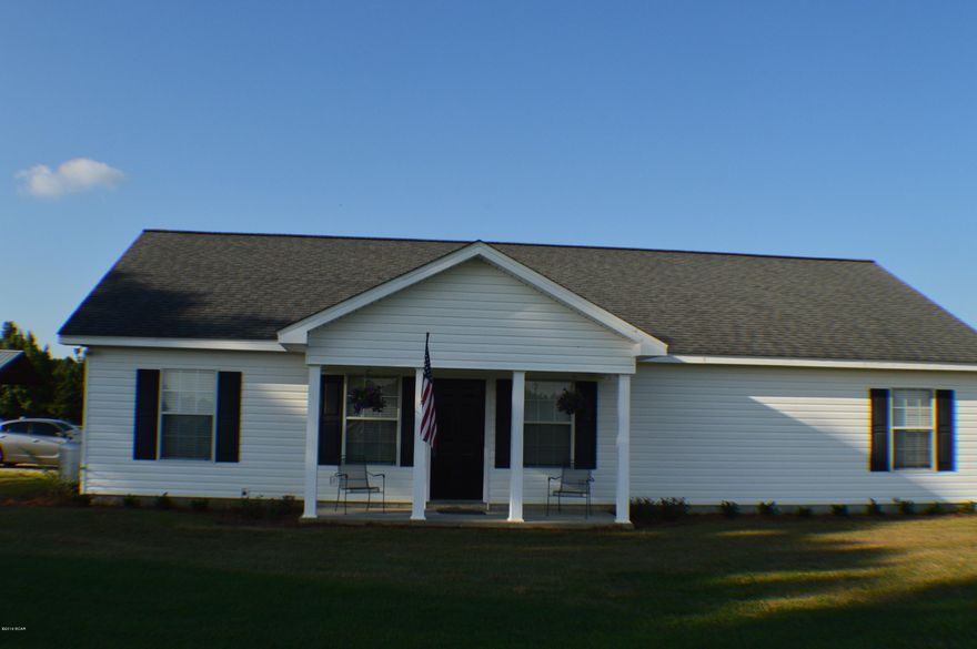 Country Living at its best!!!! Custom home just few miles from town on paved road. Home has Great room with corner fireplace gas insert open to dining and kitchen, 3 bedroom 3 full bath home.

Open concept with island bar in kitchen, large walk in pantry and utility room. Master has whirlpool tub and separate shower. Property consists of 24x36 pole barn, patio area overlooking large pond stocked with bream and bass.  Won't last long!!!!!