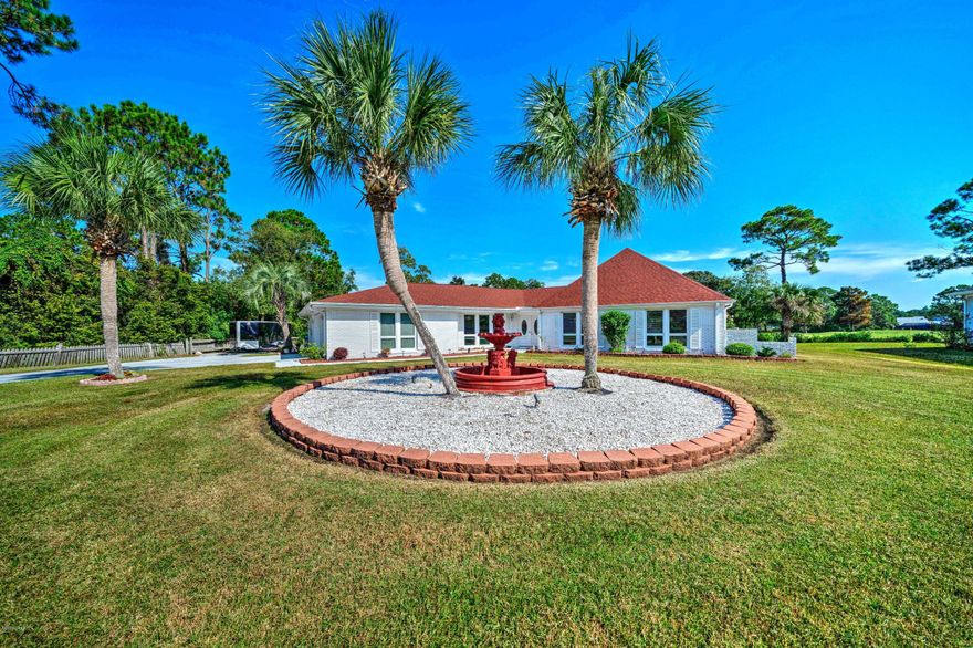 'CURRENTLY UNDER CONTRACT, SELLER ACCEPTING BACKUP OFFERS' Executive style home located at about the 150 yard marker off of the first hole of Holiday Golf Course. Home features a sunken living room with a built in full bar. Tons of room for entertaining. There is a large game room measuring 42x18 and  the sellers are leaving the pool table, foosball table, dart board etc. The kitchen is very spacious as well with a double oven, flat surface cooktop, 2 microwaves, and a huge Sub Zero refrigerator. The home boast over 3600 sq. ft. of living space.  Enjoy the new screened in cocktail pool off the rear of the home to be able to lounge around and relax. This home has so much to offer please make an appointment to view.