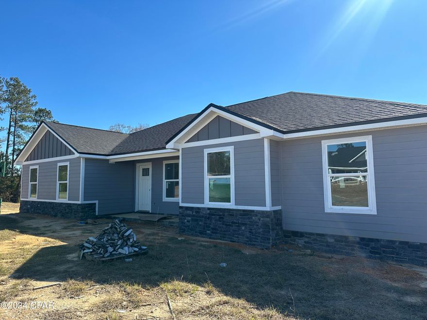 New Construction - The tranquil Cypress Tree Subdivision is nestled just minutes from downtown and features a 4 Bedroom 2 Bath, Split Floor Plan, Open Concept home on a corner 1/2 acre lot. Home features a 25 Year Architectural Style Shingle, Fiber Cement Siding, R 38 Insulation to keep those power bills down and a side facing Two Car Garage. Features inside include Hard Wood Cabinets with soft open and close drawers throughout with Granite Countertops, New Appliances, Extensive Molding throughout, Upgraded Vinyl Plank throughout and an upgraded Lighting Package. Master Bedroom includes a Tray Ceiling, a Walk-in Closet, Master Bath with a Tiled Walk-in Shower and Double Vanity. Completing the look outside with a back Covered Patio, Stone Accent on the front and a Full Landscaping Package. Under Construction with an estimated completion date of the end of July.  Call today for more information on this model and others for sale in this great neighborhood!