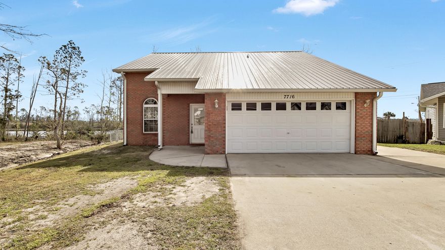 Immaculately maintained 4 bedroom, 2 bath brick home featuring a metal roof and bonus room in the Shadow Bay subdivision. This house boasts new paint, new flooring, a very large privacy fenced back yard (with a water view!) and 2 car garage. Location is very convenient to Tyndall AFB and groceries, shopping, dining and medical offices. Great opportunity and price point to own a well maintained home on a road ending with a cul de sac.
