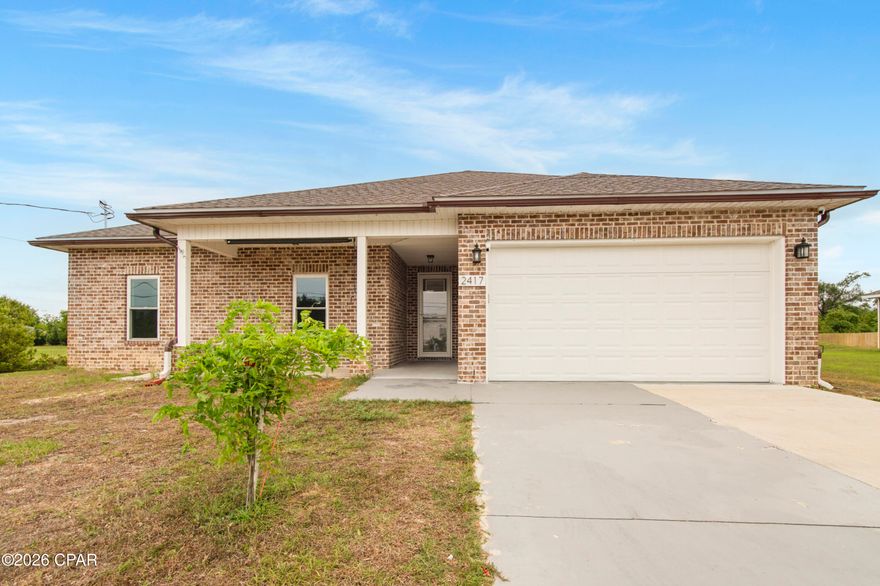 Well-maintained 4-bedroom, 2-bath home in desirable Lynn Haven, built in 2023 and situated on over half an acre with no HOA, offering space, flexibility, and room for boats, RVs, or future additions. 

Located on a quiet, dead end street, this newer construction home was built with modern standards and construction upgrades that enhance durability, efficiency, and overall peace of mind.

Inside, you'll find a spacious, split-bedroom floor plan, with LVP floors throughout and tray ceilings in multiple rooms that add character and style. The spacious primary suite features a large walk-in closet and an en-suite bath with his and her sinks, while the guest bathroom includes a double vanity for added convenience.

Enjoy the added versatility of an enclosed back patio with windows and sliding glass doors, perfect for year-round relaxing or entertaining. The home also includes an upgraded water softener system and filtered kitchen sink water, ideal for well and septic living, along with an elevation certificate that may offer insurance benefits.

The expansive yard provides plenty of room to enjoy the outdoors, and the location offers convenient access to shopping, dining, and parks--all while being within walking distance to the popular Rails to Trails for biking, jogging, and outdoor enjoyment.

If you're looking for a newer home, space, and freedom without HOA restrictions, this property stands out. Buyer to verify all information. Information deemed reliable, but not guaranteed.