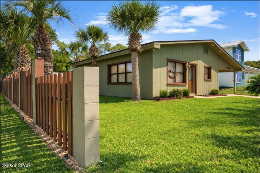 Charming beachside home located just one block from Panama City Beach. 
The home features an updated kitchen with stainless steel appliances, modern countertops, and quality finishes, along with updated bathrooms showcasing elegant tile work. A versatile flex room provides the option for a third bedroom, home office, or additional living space.
The exterior offers a large fenced backyard with well-maintained grass, providing ample space for outdoor activities and room for a pool. Additional features include an outdoor shower, landscape lighting, a storage shed with covered seating area, attached garage, and additional covered parking.
Enjoy a Gulf view from the property and take advantage of the prime location near Pier Park, local dining, shopping, and entertainment, with convenient access to the 30A area.
Recent updates include a new roof installed in July 2024 with a 10-year, 130 MPH warranty, and an A/C unit approximately 6 years old.
This property presents an excellent opportunity for a primary residence, second home, or investment property in a highly desirable beachside location.