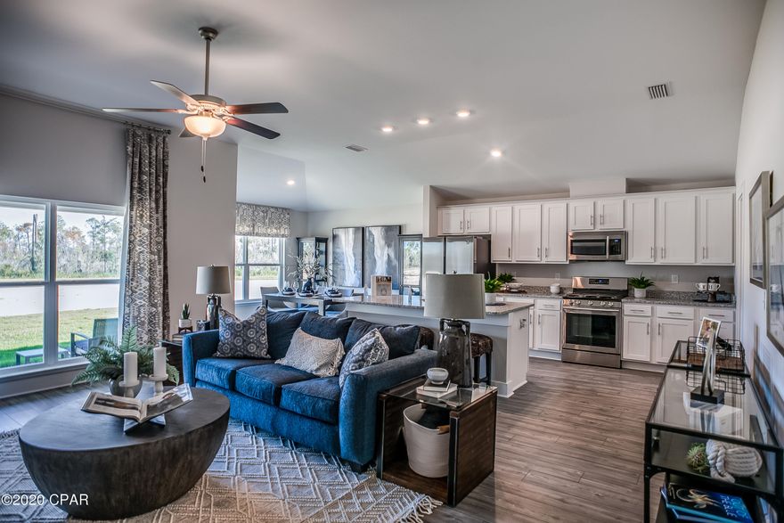 New construction by Truland Homes in the highly desirable Callaway Area! With 4 Bedrooms, 3 Baths, this Rushmore open floor plan home is a must-see, with a stunning interior featuring 10' high ceilings in the main living areas and a 9' tray ceiling in the master suite. Luxury Vinyl Plank floors, granite countertops, and so much more are found throughout the home. The exterior boasts of Hardi Board on all four sides, Tankless Gas Water Heater, and a completely landscaped yard with a sprinkler system. Offering added innovative technology and convenience, this home is equipped with a SMART Things hub, a Ring security doorbell, a Samsung tablet, and a Nest energy-efficient thermostat. Conveniently located to shopping, recreational parks, schools, and Tyndall Air Force Base.2.5