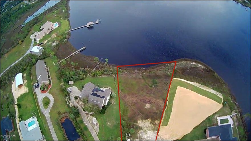 Beautiful waterfront lot with breathtaking views and sunrises. By far the best lot in The Oaks subdivision, with access to the Gulf. Imagine drinking your morning coffee on the back porch overlooking Cooks Bayou. This cleared lot is located at the end of a Cul-De-Sac surrounded by custom built houses, friendly neighbors and without the burden of an HOA. Build your dream waterfront house and dock with deep water access to the Gulf. Enjoy the cool evening breeze from the Gulf as you grill the catch of the day with friends and family. Located not far from Tyndall AFB,  Eastern Shipbuilding Yard, schools, shopping and, of course, water activities.